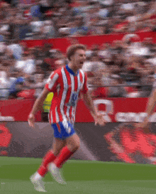 a soccer player wearing the number 8 on his jersey