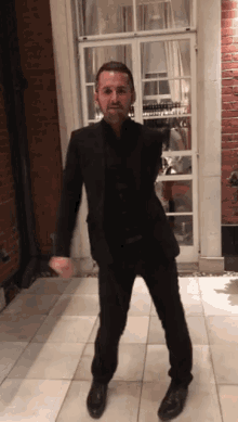 Floss Dance Black Suit Celebration Johnny Connelly GIF