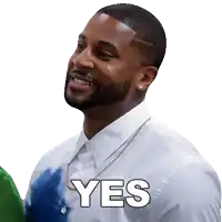 a man in a white shirt has the word yes on his chest