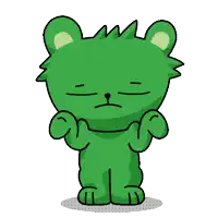 a green teddy bear is making a funny face