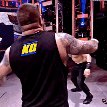 Kevin Owens Stunner GIF - Kevin Owens Stunner Roman Reigns GIFs