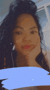 a woman 's face is shown with a blue border and the date 2044 on the bottom