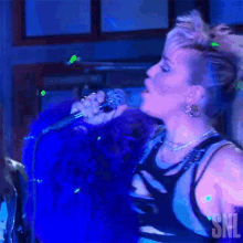 Performing Miley Cyrus GIF - Performing Miley Cyrus Without You Song GIFs