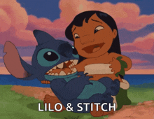lilo and stitch are sitting next to each other