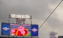 a billboard for the twins shows a pig on it