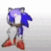 a blurry picture of a cartoon character , sonic the hedgehog , standing on a white surface .