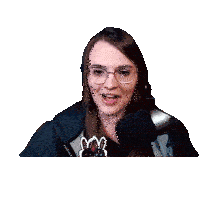 a woman wearing glasses is giving a high five in front of a microphone .