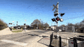 a railroad crossing has a sign that says " exit only "
