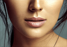 a close up of a woman 's face with her lips visible