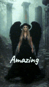 a woman in a black dress with angel wings stands in front of a pillar with the words amazing written on it