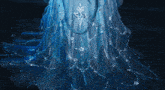 a painting of a woman in a blue dress with beads