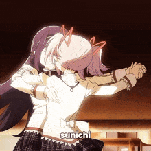 a couple of anime girls hugging with the word sunichi on the bottom right