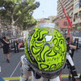 a person wearing a helmet that says " pure " on it