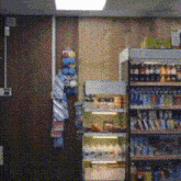 a blurred image of a store with shelves full of soda