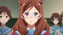 a girl with glasses and a cat ear hairstyle looks at the camera