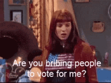 a pixelated image of a woman asking if people are bribing people to vote for her
