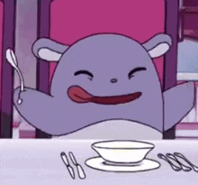 a purple cartoon character is sitting at a table with a spoon in his mouth .