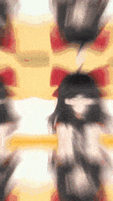 a blurred image of a person 's face with a red and yellow background