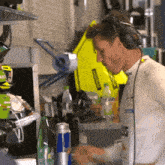a man wearing headphones and a shirt that says j.s.