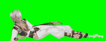 a person is laying on their stomach on a green screen with the word imgplay in the corner