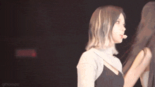 a blurry photo of a woman with the words gifsaespa written on the bottom