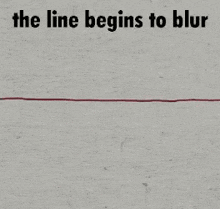 a close up of a gray carpet with a red line on it .