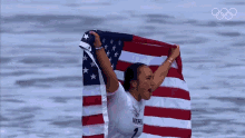 Raise The Flag Carissa Moore GIF - Raise The Flag Carissa Moore Nbc Olympics GIFs
