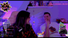 a man and a woman are looking at each other in front of a screen that says followers goal 2460/2500