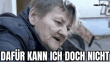 a close up of an elderly woman 's face with the words `` dafür kann ich doch nicht '' written on it .