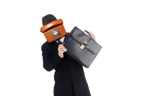 a man holding a briefcase and a telephone in front of his head
