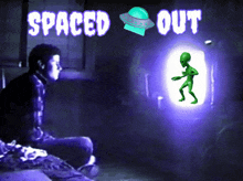 a man is sitting in a dark room with the words spaced out written above him