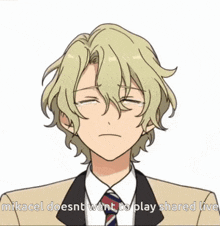a man in a suit and tie is making a sad face with the words mikacel doesnt want to play shared live
