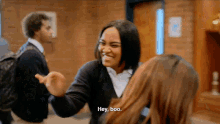 a girl talking to another girl with the words hey boo on the bottom