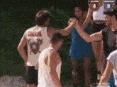 a man wearing a tank top with the word guadalupe on the back