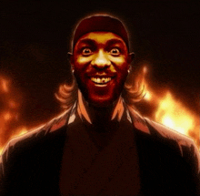 a man in a red hat is smiling in front of a fire