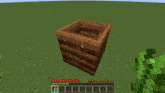 a screenshot of a minecraft game shows a wooden box with a cross in the center