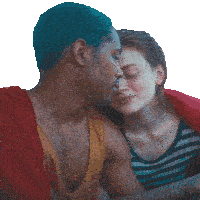 a man with blue hair is kissing a woman on the cheek