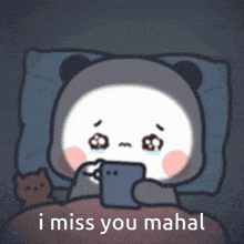 a cartoon panda is laying in bed looking at a cell phone with the words i miss you mahal written below it
