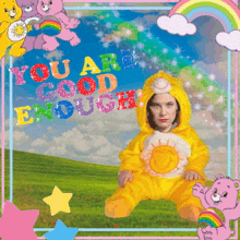 a picture of a baby in a care bear costume with the words you are good enough