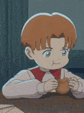 a young boy with red hair is eating a piece of food