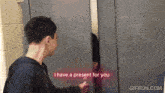 a man says i have a present for you behind a locker