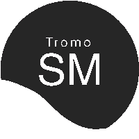 a black circle with the word tromo sm written on it