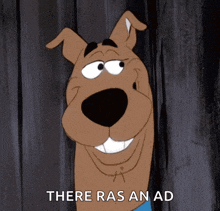 scooby doo says there ras an ad in front of a wooden wall