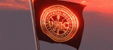 a black flag that says universal music community is waving in the wind