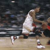 a basketball player in a white jersey and red shorts is running with the ball