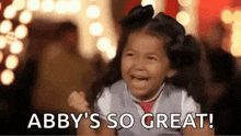 a little girl is crying and screaming with the words `` abby 's so great '' written next to her .