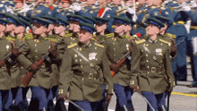 a group of soldiers marching in a line with the number 11 on their uniforms