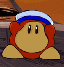 a close up of a cartoon character wearing a hat and a red shirt .
