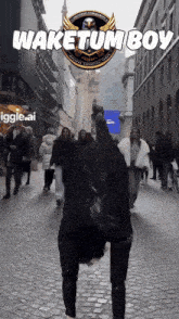 a person is doing a handstand in front of a sign that says wake tumboy