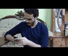 مجدي Phone GIF - مجدي Phone Bored GIFs